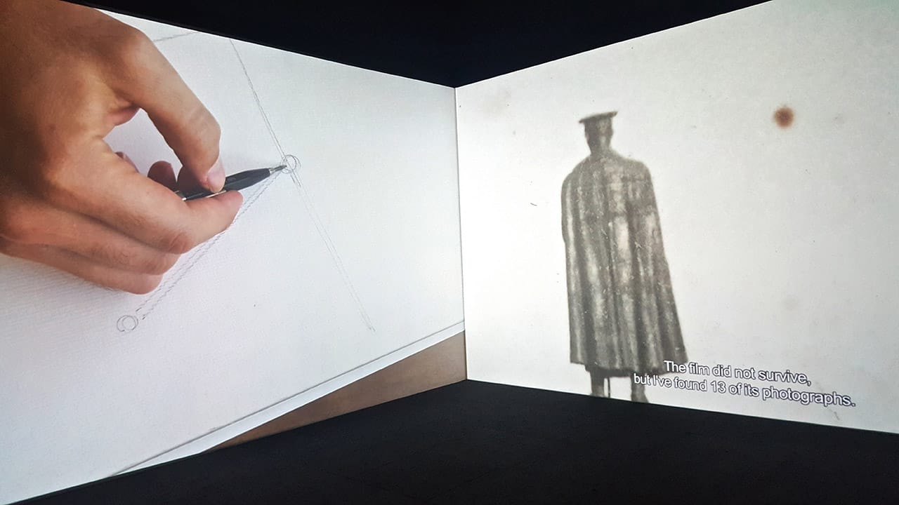 In Dor Guez's video for 'The Sick Man of Europe: The Architect," a draftsman on the left sketches out architectural studies of the locations photographed by Kemal P. and his companion in the late 1930s, marking a piece of the former Ottoman Empire's shift into modern-day Turkey. (all photos by the author for Hyperallergic)