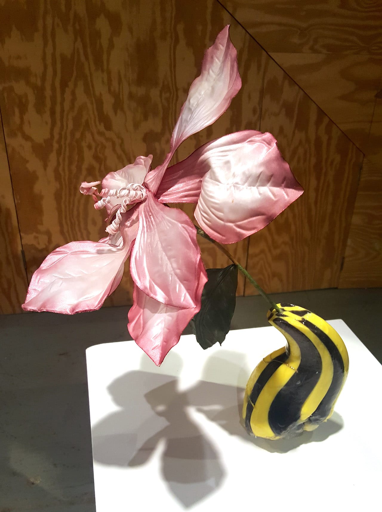 "Yellow Vase" (2015), lacquered candy, hot glue, bow, fake flower (click to enlarge)