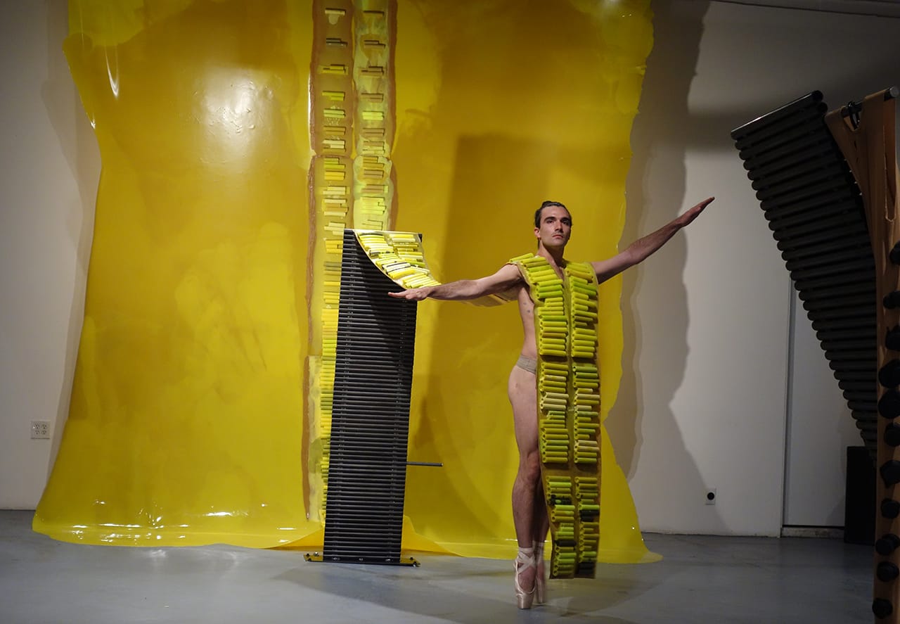 Silas Riener performing with Martha Friedman's 'Pore' at Locust Projects