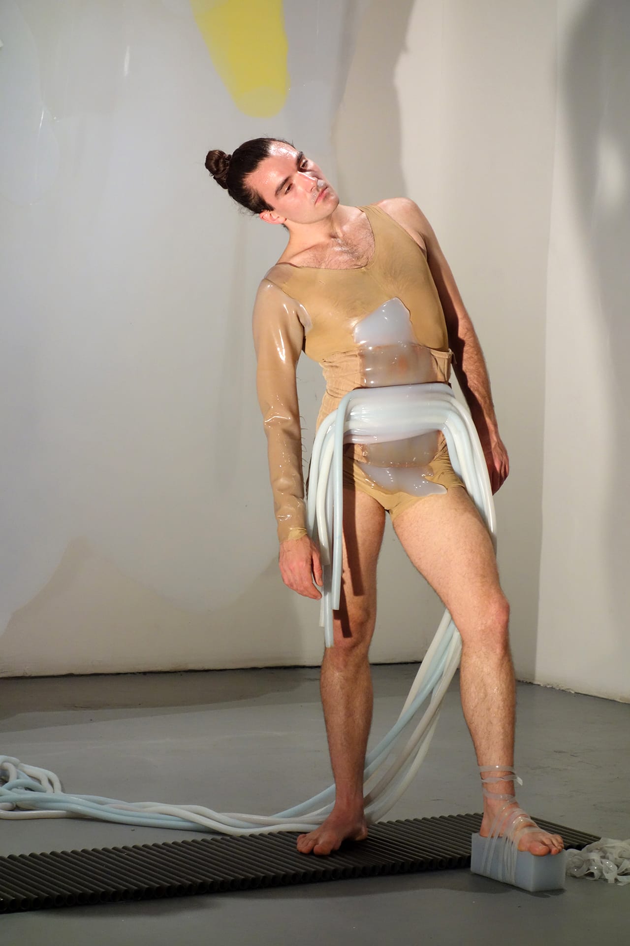 Silas Riener performing with Martha Friedman's 'Pore' at Locust Projects
