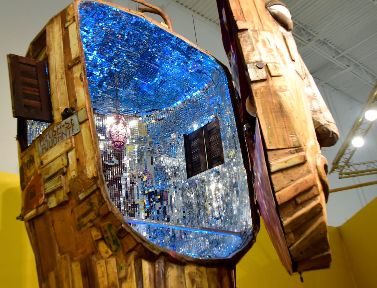 Detail of a large piece by Os Gemeos in 'Everything you are I am not' at Mana Wynwood