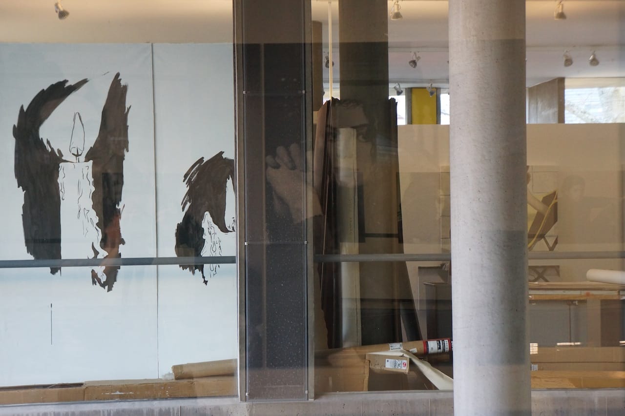 A reflection of Michael Jackson in the gallery winow