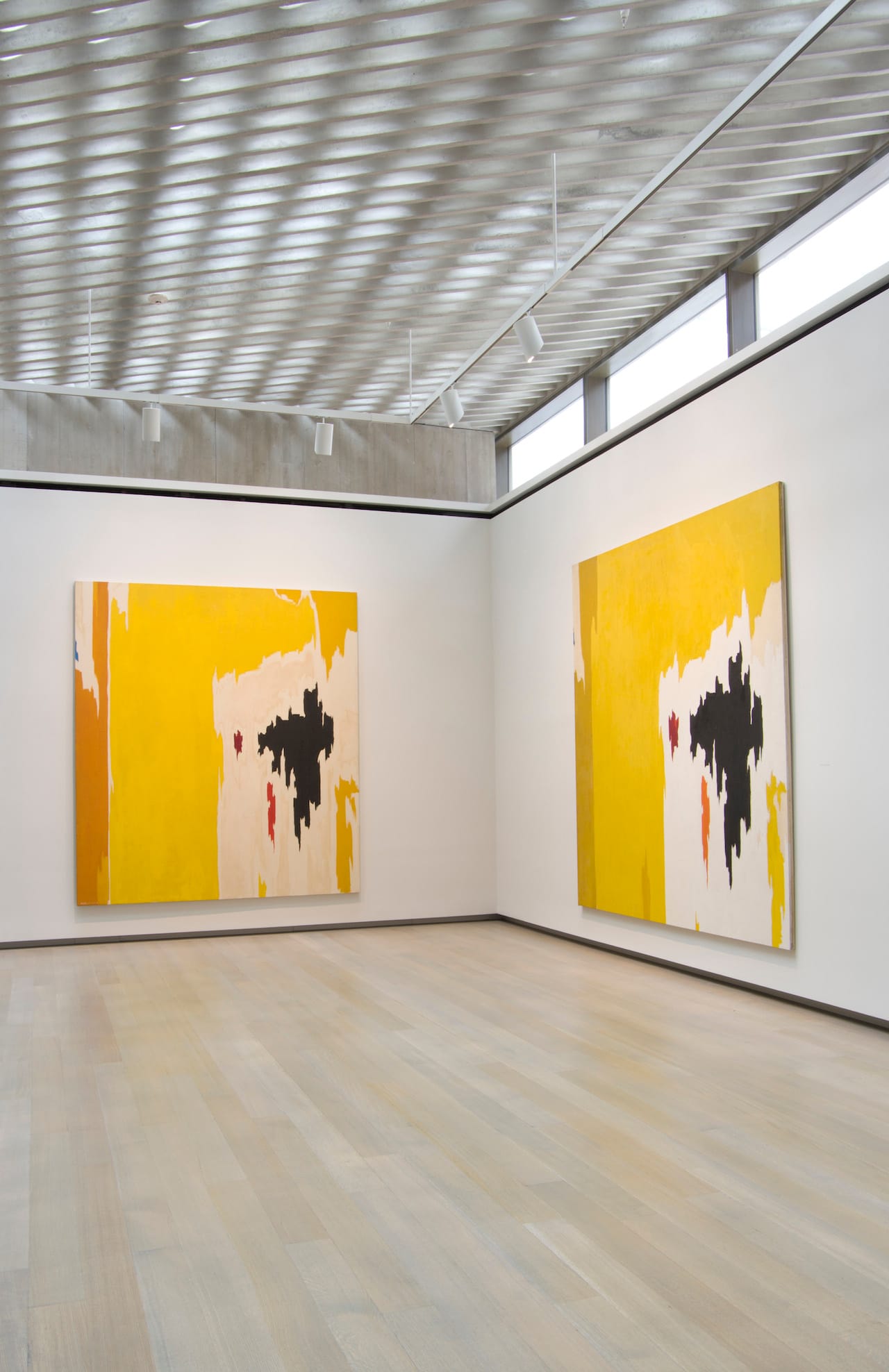 Installation view of 'Repeat/Recreate' at the Clyfford Still Museum with "PH-1074" (1956–9, left, Clyfford Still Museum © City and County of Denver) and "PH-225" (1956, right, collection of the Modern Art Museum of Fort Worth, Museum purchase, The Benjamin J. Tillar Memorial Trust © City and County of Denver)