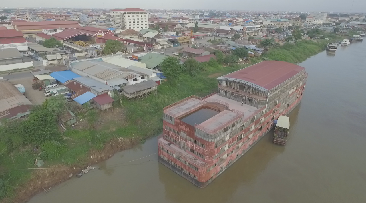 The Boat with sprawling Phnom Penh in the background.