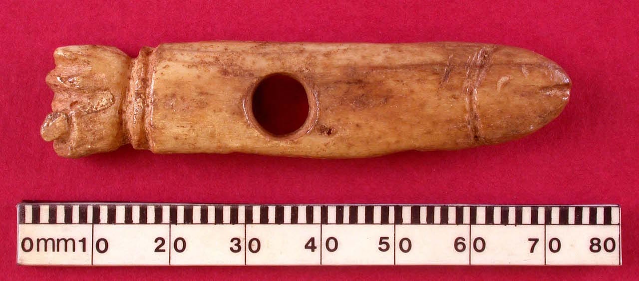 lincoln fist and phallus pendant