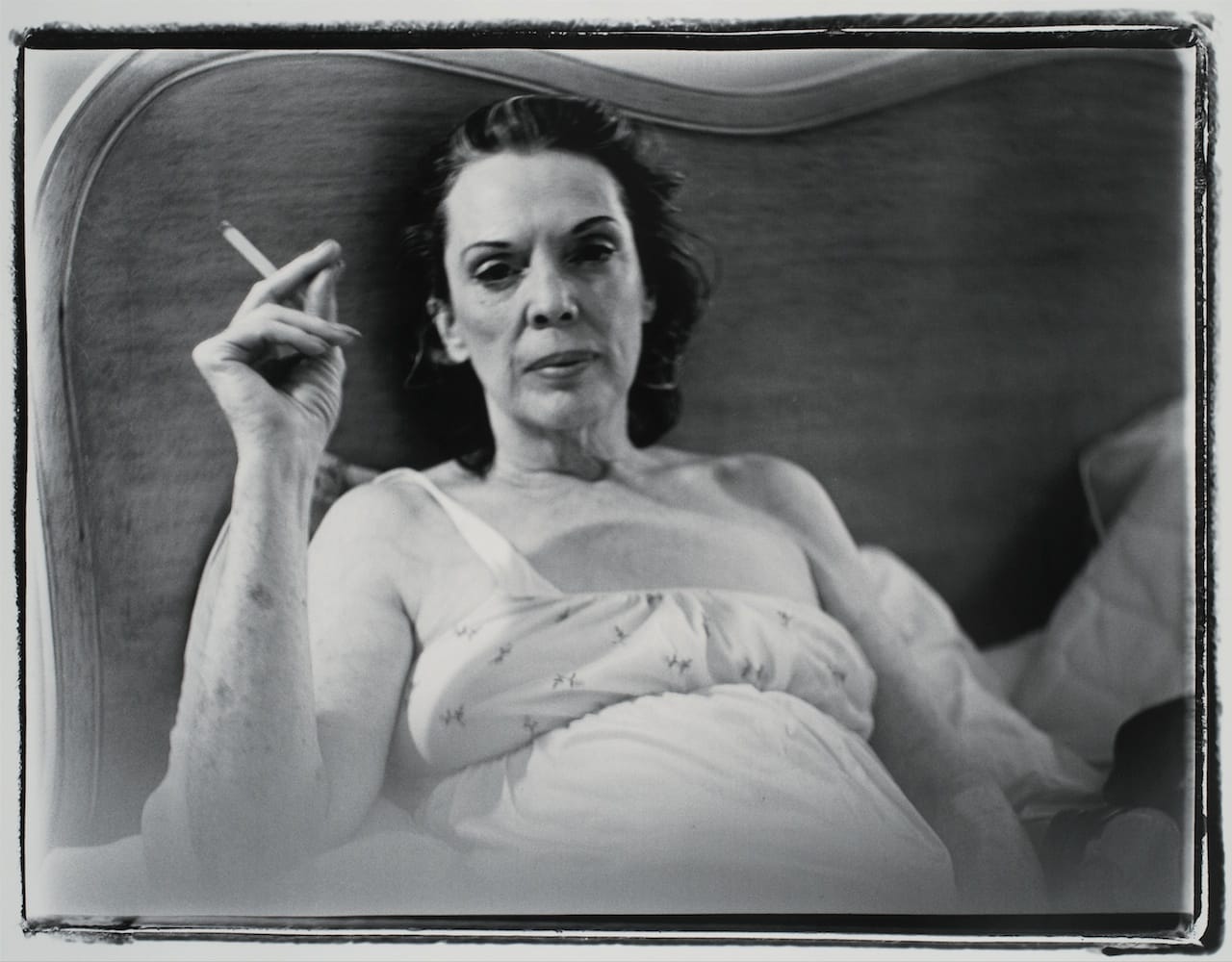 Marilyn Minter, "Coral Ridge Towers (Mom Smoking)" (1969), gelatin silver print, sheet 16 by 20 in. (collection of Beth Rudin DeWoody)