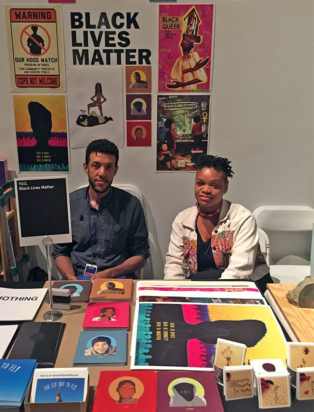 Erin Christovale (right) at the Black Lives Matter booth