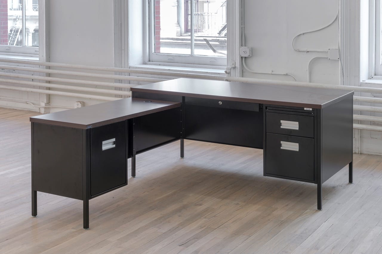 Attica Series Desk, 2016 Steel, powder coating, laminated particleboard, distributed by Corcraft 60 71.5 28.75 inches Rental at cost The Attica Series Desk is manufactured by prisoners in Attica Correctional Facility. Prisoners seized control of the D-Yard in Attica from September 9th to 13th 1971. Following the inmates’ immediate demands for amnesty, the first in their list of practical proposals was to extend the enforcement of “the New York State minimum wage law to prison industries.” Inmates working in New York State prisons are currently paid $0.10 to $1.14 an hour. Inmates in Attica produce furniture for government offices throughout the state. This component of government administration depends on inmate labor. Courtesy of the artist and ESSEX STREET, New York Photo: Adam Reich
