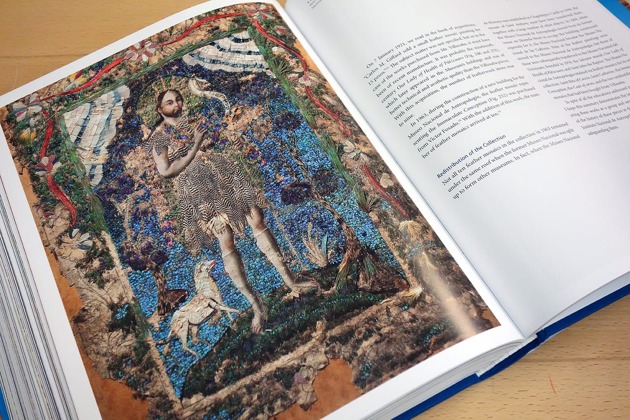 Pages from 'Images Take Flight: Feather Art in Mexico and Europe' (photo of the book for Hyperallergic)