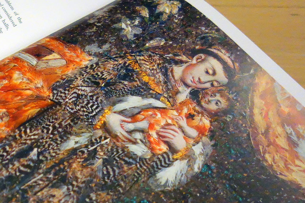 Pages from 'Images Take Flight: Feather Art in Mexico and Europe' (photo of the book for Hyperallergic)