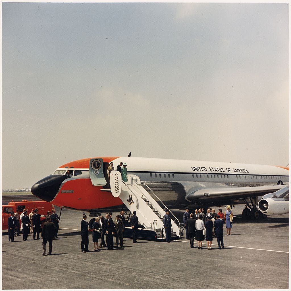 John F. Kennedy exiting Air Force One in Mexico City (1962) (via National Archives and Records Administration/Wikimedia)