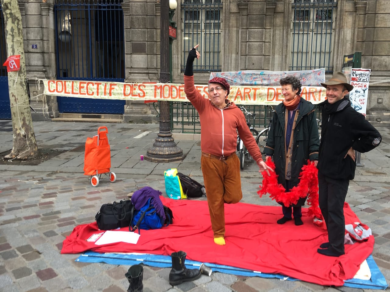 Members of the Collectif des Modèles d’Art de Paris demonstrate in the Place de l'Hôtel de Ville.