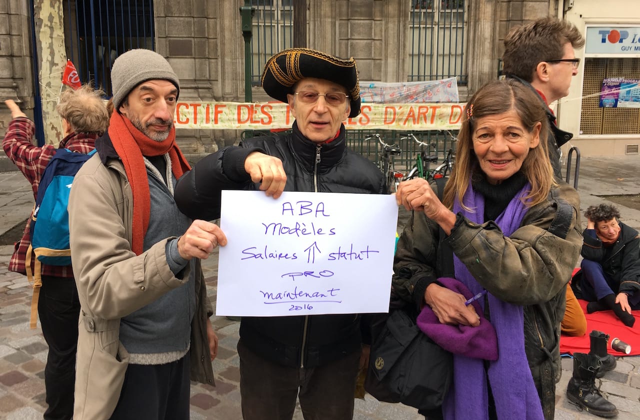 Members of the Collectif des Modèles d’Art de Paris demonstrate in the Place de l'Hôtel de Ville.