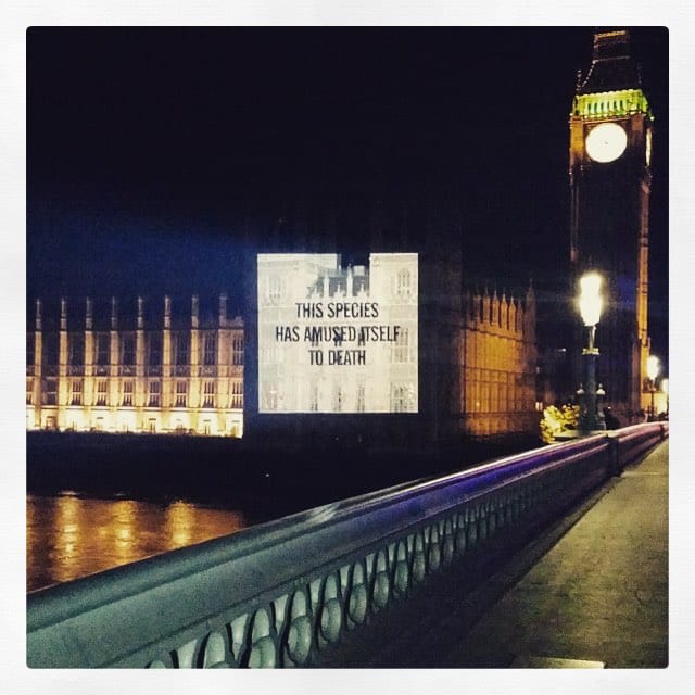 Album art for 'Amused to Death' projected on Houses of Parliament (image via @sarahmcgiven/Instagram)