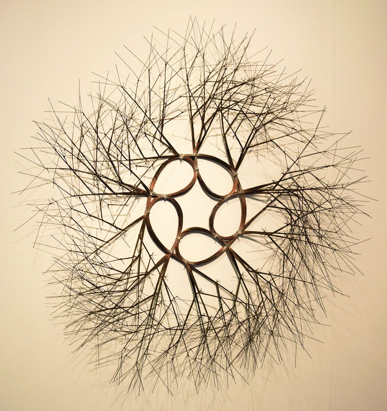 Ruth Asawa, "Sun and Star (S.616/60)" (ca. 1966) in the Michael Rosenfeld gallery booth at the 2016 Armory Show