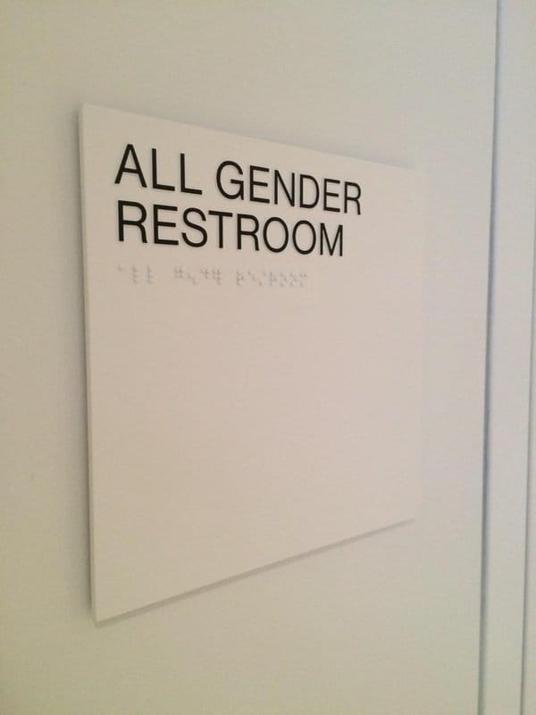 Gender neutral bathroom signs at the Whitney (photo by Ben Sutton for Hyperallergic) (click to enlarge)