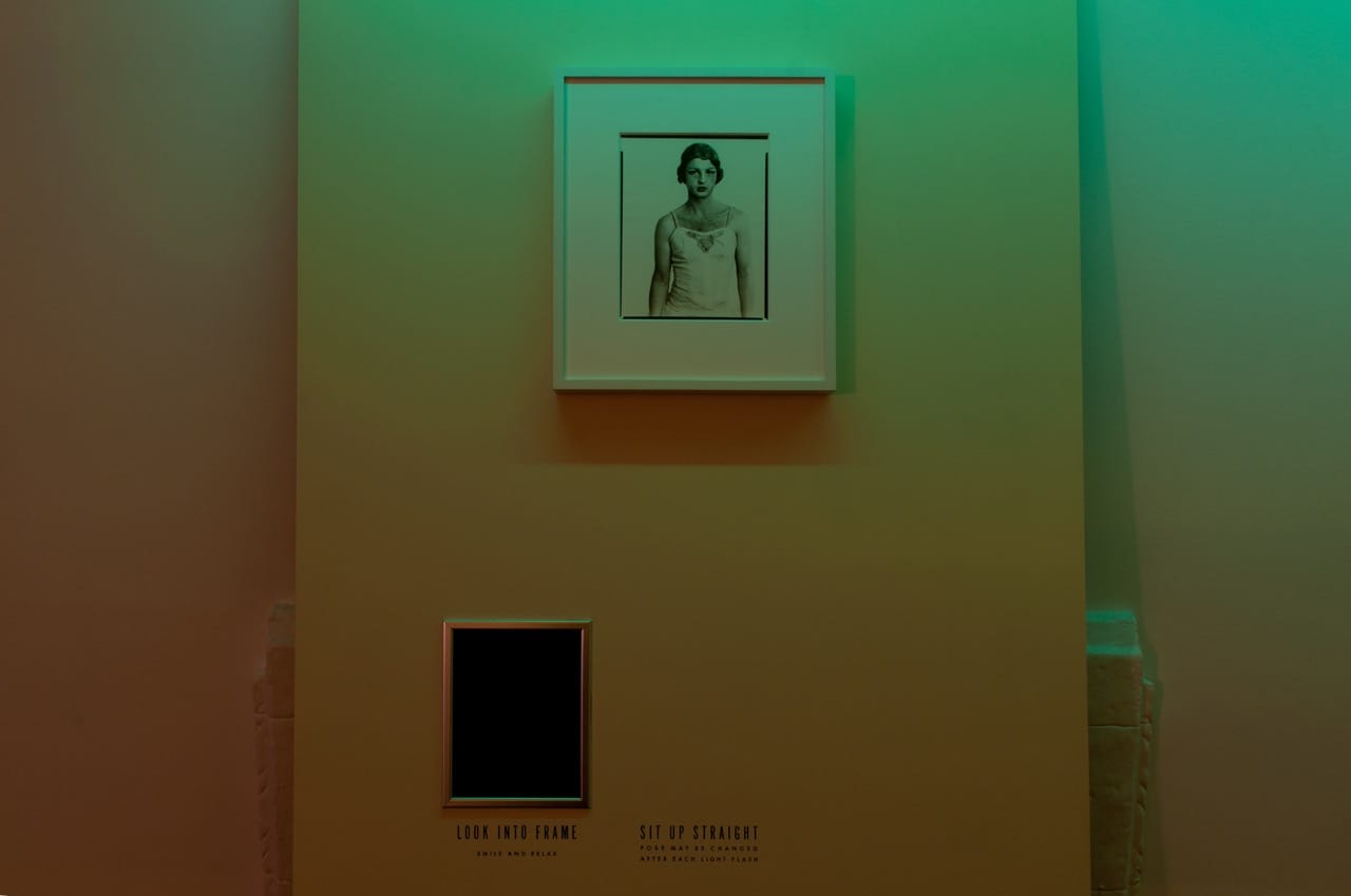 Hilton Als, Smile and Relax (for Brent Sikkema and Kenneth E. Silver), 2016, 91 x 38 inches, MDF with embedded frame and lettering; Richard Avedon, John Martin of Les Ballets Trockadero de Monte Carlo, New York, March 15, 1975, 14 x 16 ¼ inches (framed), gelatin silver print, courtesy the Richard Avedon Foundation