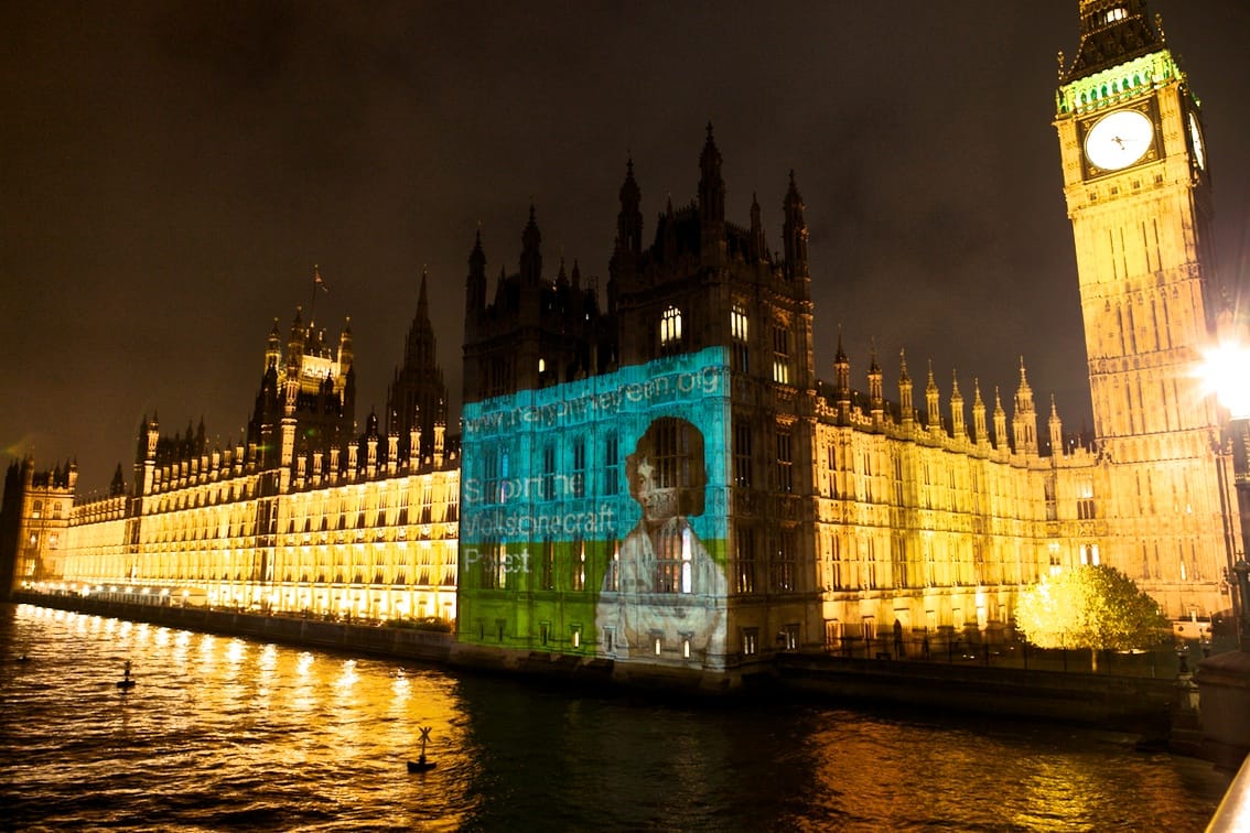 An image of the Mary Wollstonecraft Project, projected onto the Houses of Parliament (photo by Neil Wissink via Wikipedia)
