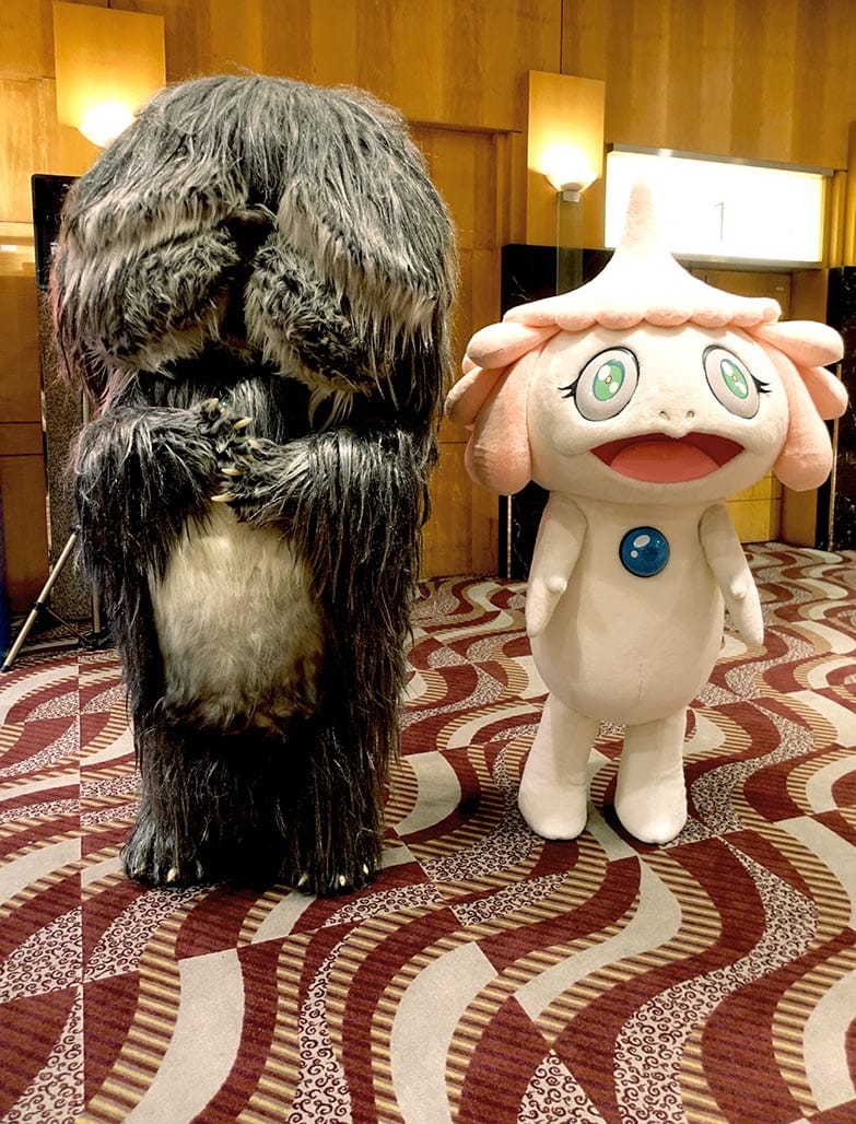 Takashi Murakami characters Luxor and Kurage-bo greeting film goers at a screening of 'Jellyfish Eyes' (2013) during ABHK