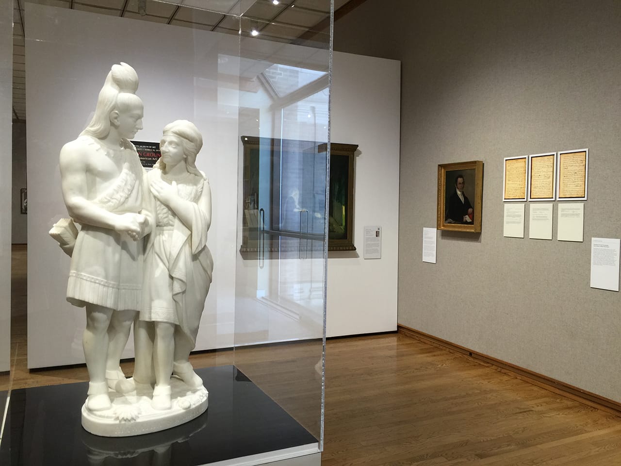 Edmonia Lewis's “The Marriage of Hiawatha” (TK), with Henry Ossawa Tanner’s “The Holy Family” and Joshua Johnson’s portrait of Thomas Boyle (click to enlarge)