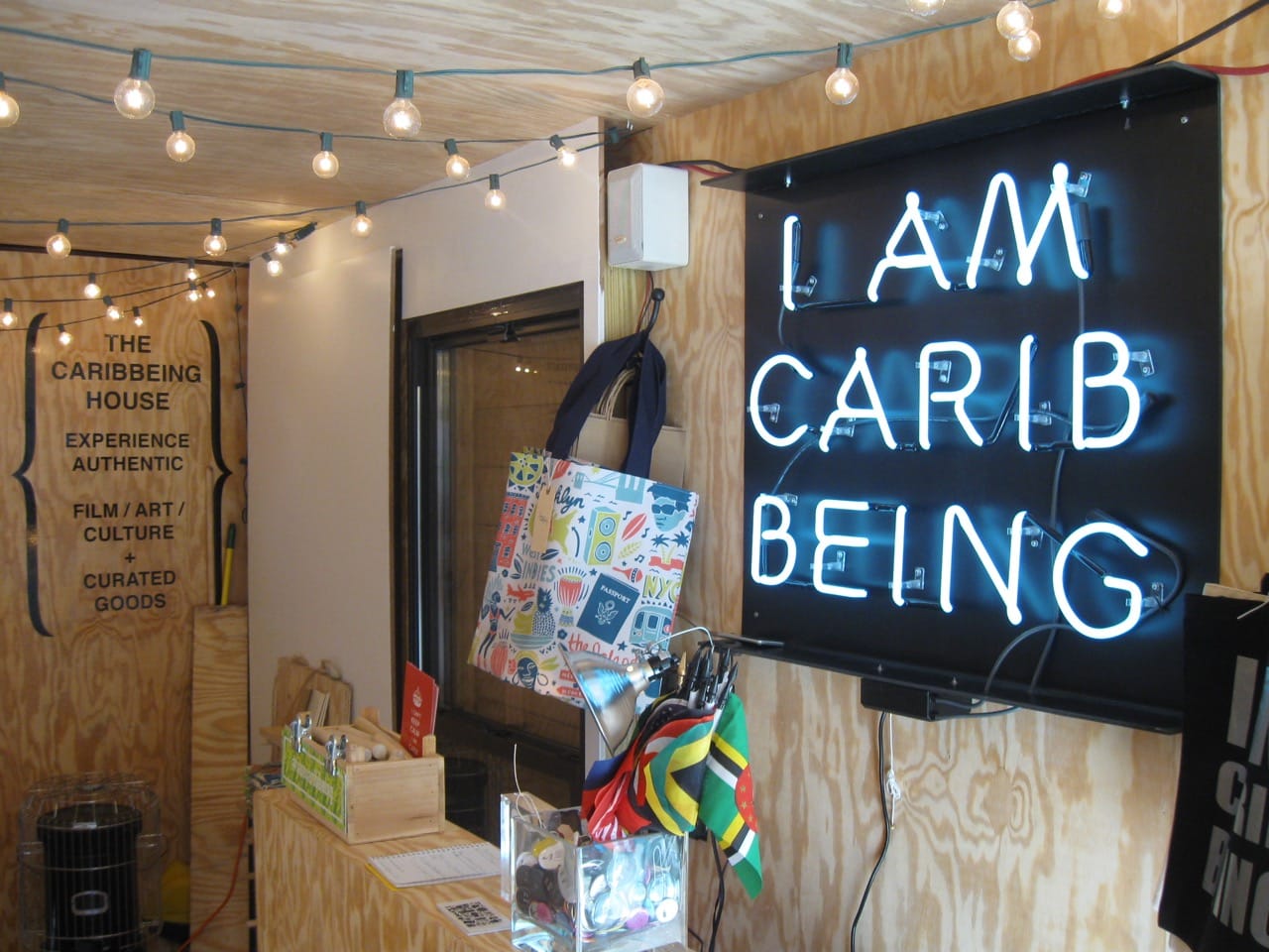 Items for sale near the cash register inside the Caribbeing House