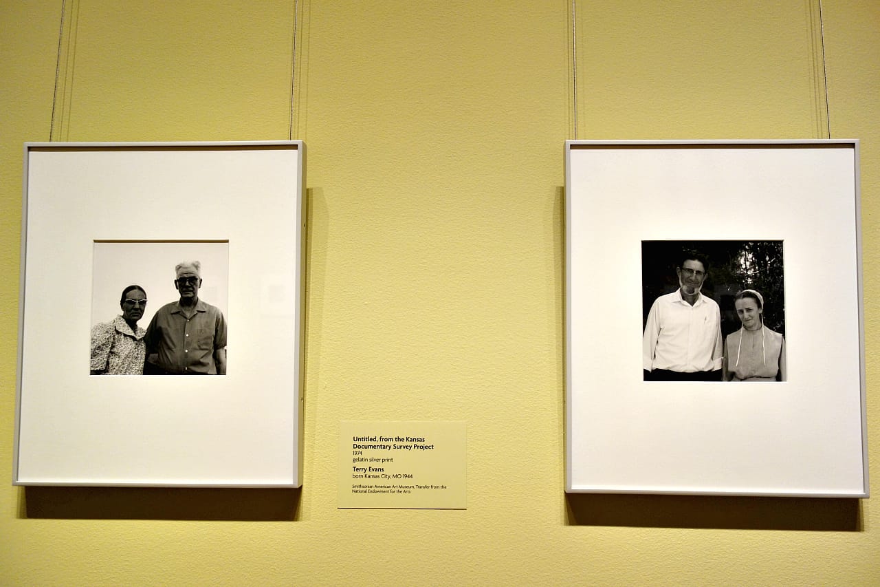 Photographs by Terry Evans of a Kansas couple and two Amish Mennonites (photo by the author for Hyperallergic)