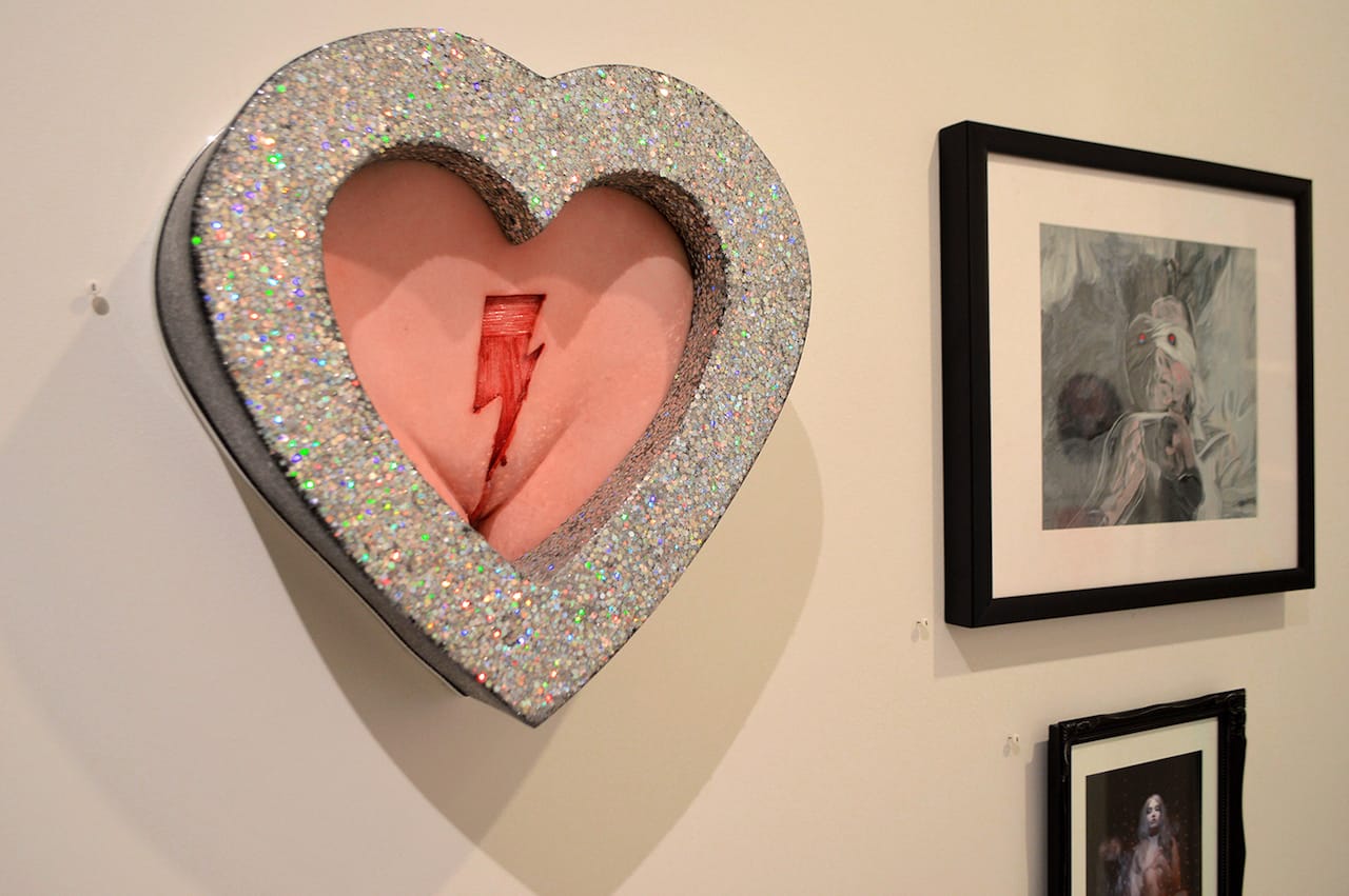 'Saint Bowie' installation view with Colin Christian "Ziggy Played" (2016, left) and Buddy Nestor "We Are Made of Stars" (2016, right)