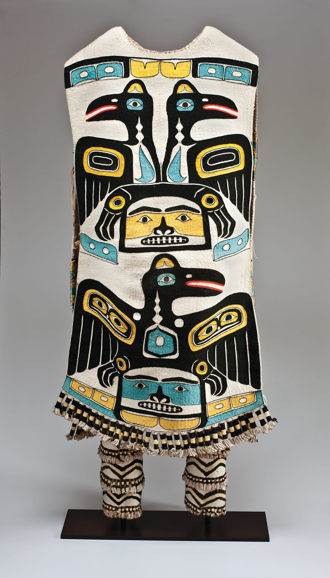 Tlingit, Chilkat, Klukwan, Alaska, Tunic and Leggings (late 19th century), cedar bark, wool, metal cones (courtesy Toledo Museum of Art) (click to enlarge)