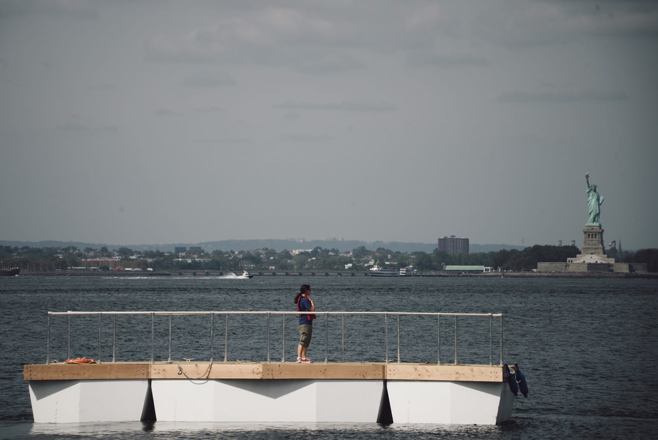 Nancy Nowacek standing on the "Citizen Bridge" "Superblock Prototype" in Gowanus Bay