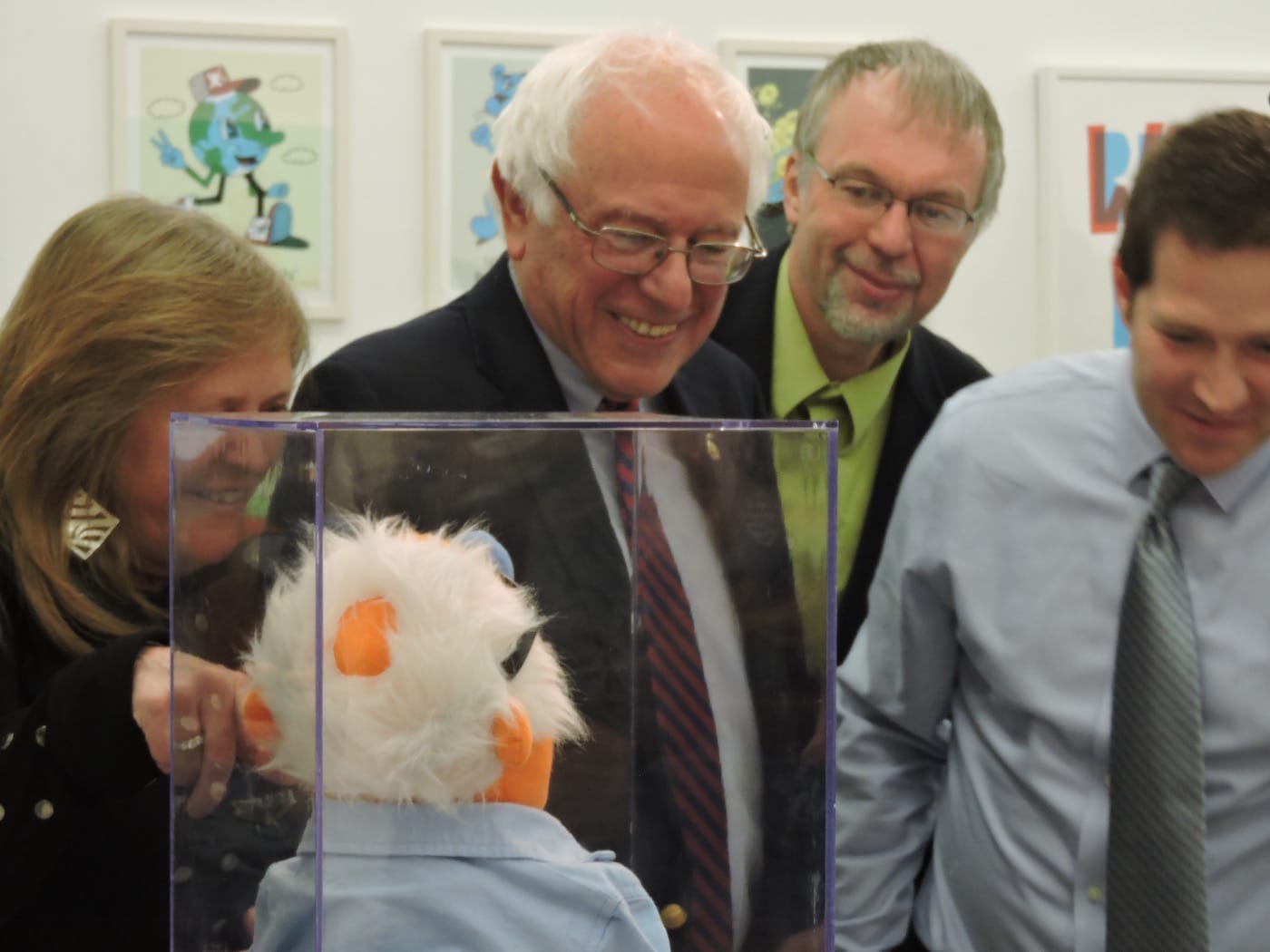 Bernie laugs at Dan Muller's untitled art work of him as a Muppet (image by author for Hyperallergic) 
