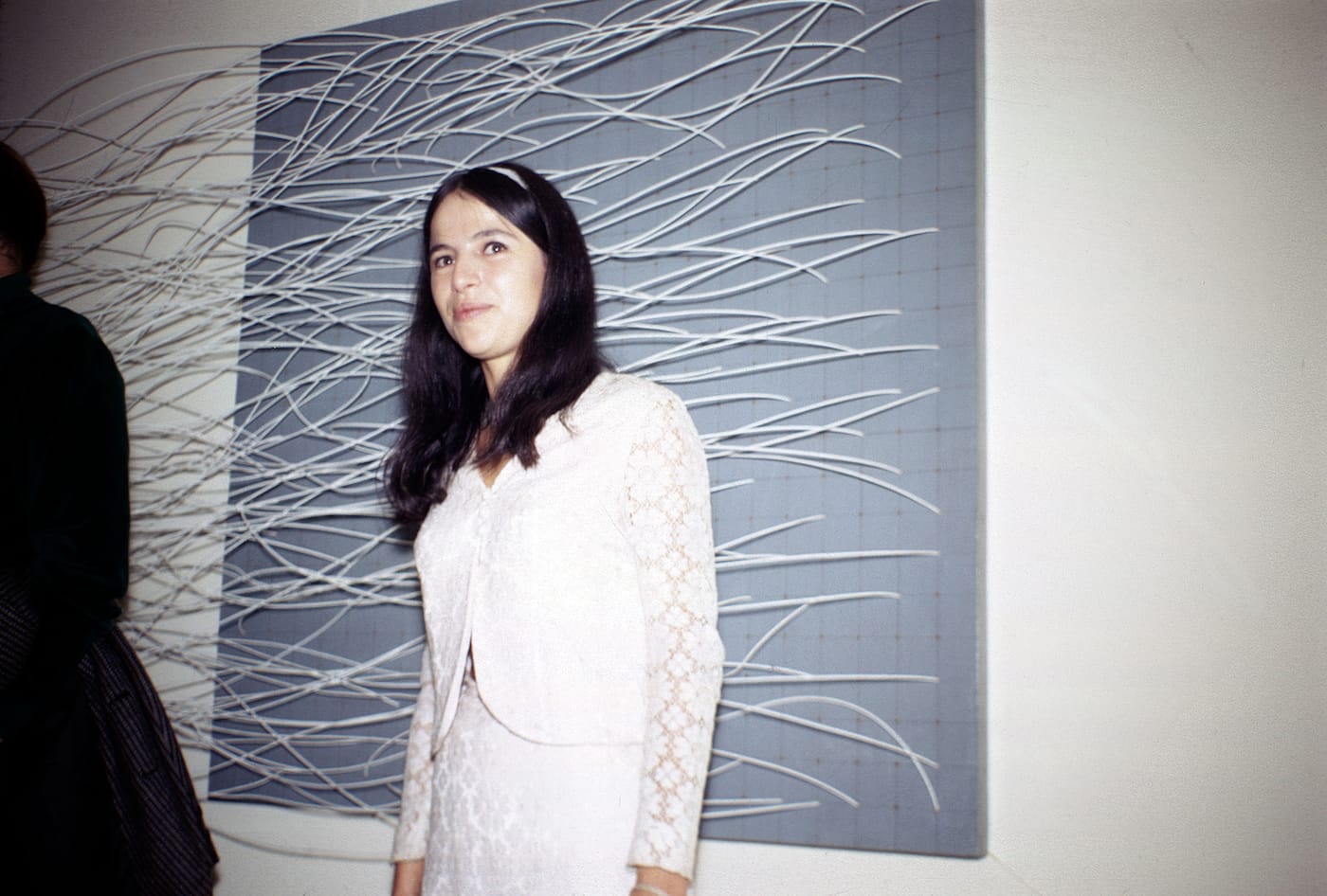 Eva Hesse at the opening reception for 'Eccentric Abstraction,' 1966 (photo by Norman Goldman)