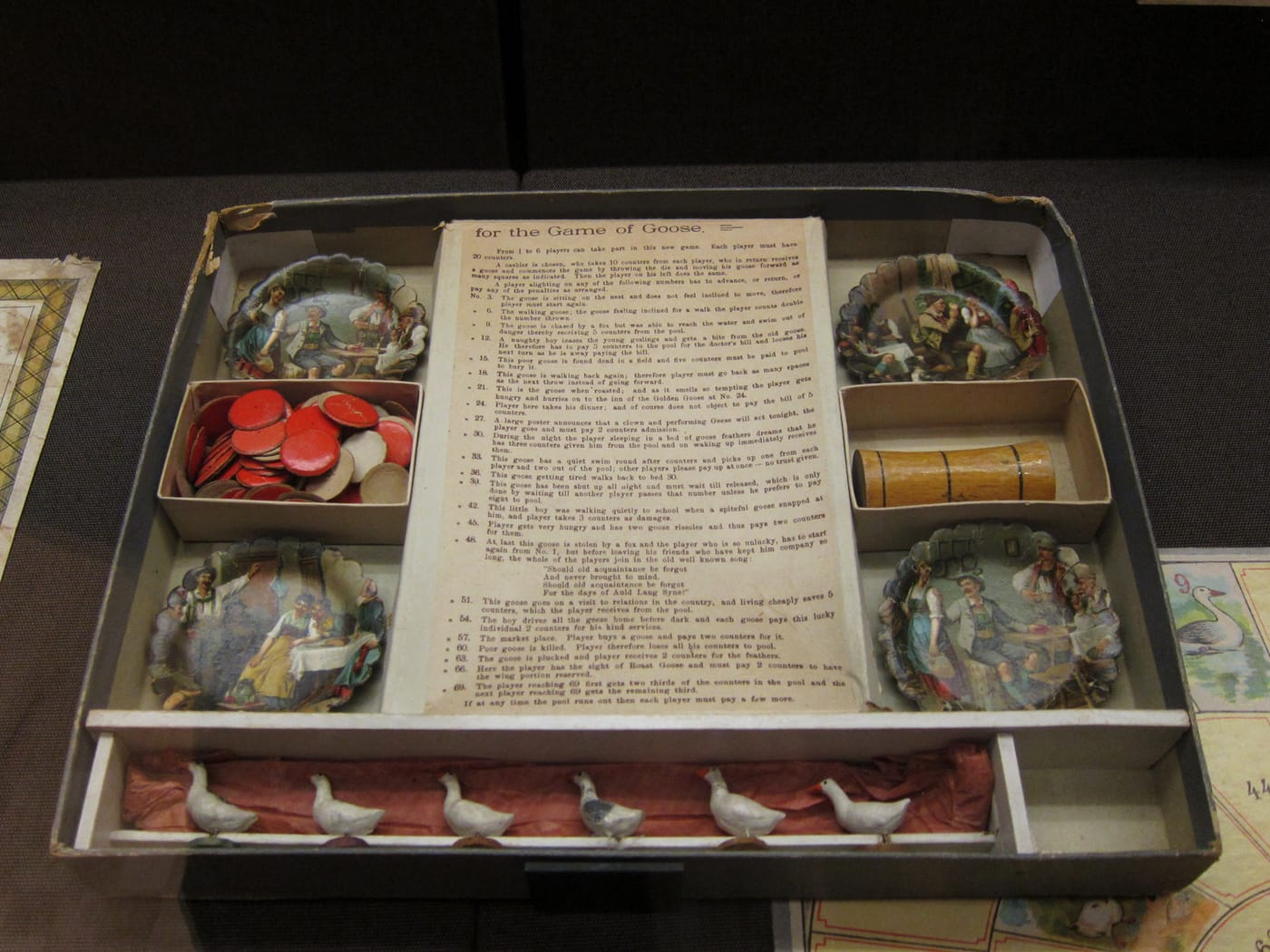Playing equipment for "The Game of the Goose — Improved Edition" (c. 1900) from Nuremberg, Germany