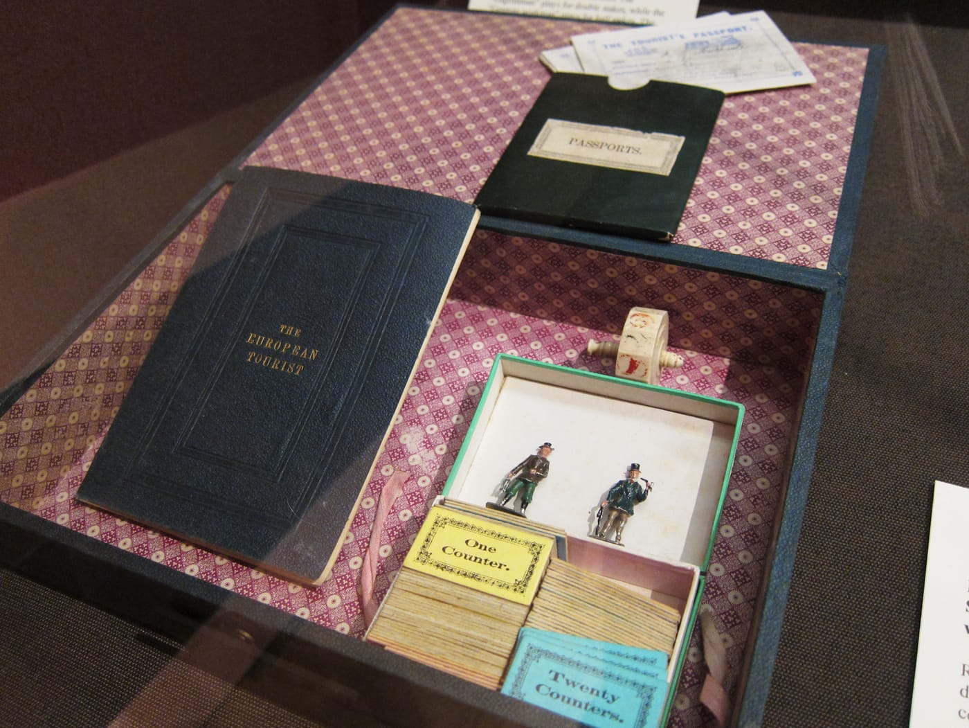 Playing equipment and rule book for "The European Tourist" (c. 1870)