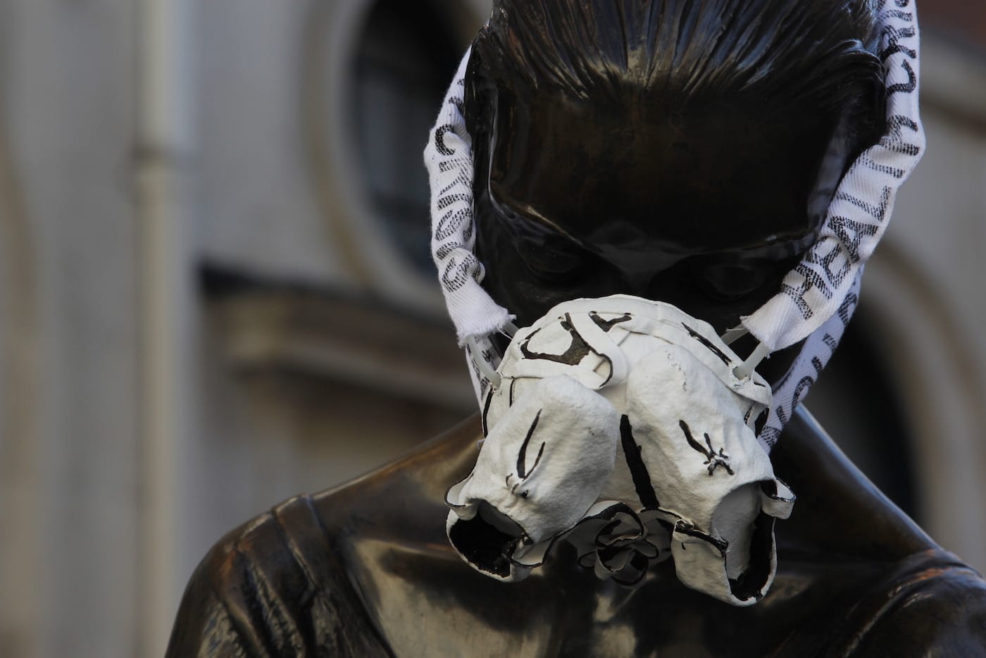 Greenpeace activists fit the Young Dancer statue in Covent Garden with an emergency face mask to demand action on air pollution. Earlier this morning, a separate Greenpeace team eluded security and climbed over the fence around the Houses of Parliament to put another mask on Oliver Cromwell’s statue. Famous statues of Winston Churchill in Parliament Square, Nelson’s Column above Trafalgar Square and Eros at Piccadilly Circus, have also been given protection against London’s dirty air by environmental activists.