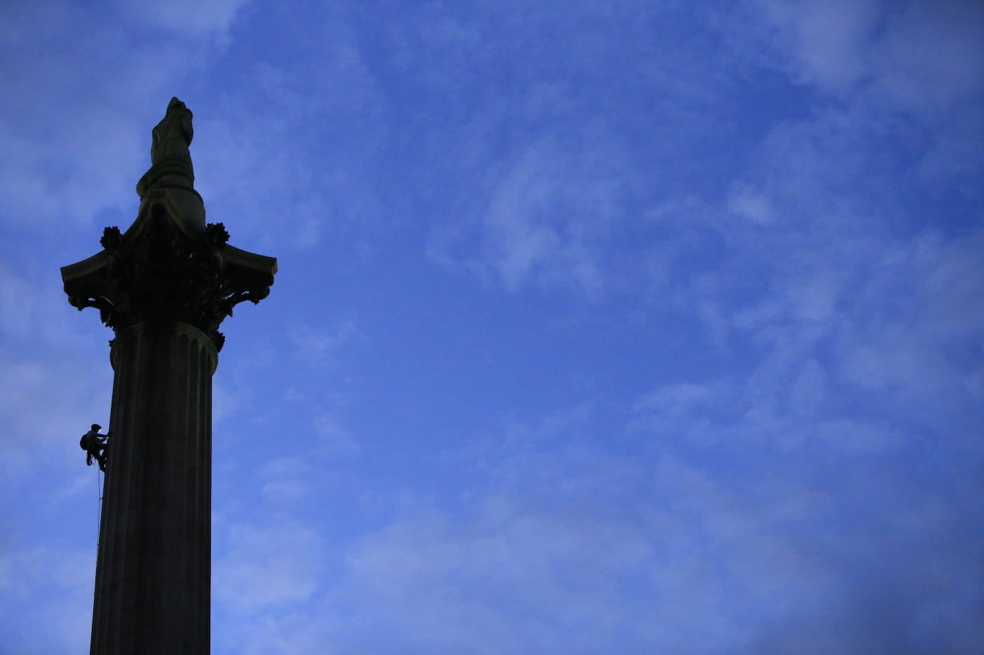 Two Greenpeace activists started climbing Nelson’s Column at 4am today to demand action on air pollution. Alison Garrigan (29) and Luke Jones (30) fit the statue of Admiral Lord Nelson, towering 52 metres above Trafalgar Square, with an emergency face mask. Earlier this morning, a separate Greenpeace team eluded security and climbed over the fence around the Houses of Parliament to put another mask on Oliver Cromwell’s statue. Famous statues of Winston Churchill in Parliament Square, Queen Victoria opposite Buckingham Palace and Eros at Piccadilly Circus, have also been given protection against London’s dirty air by environmental activists.