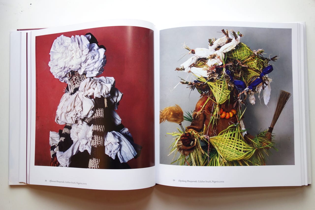 Affianwan Masquerade and Ekpokang Masquerade from Calabar South, Nigeria (2005), from Phyllis Galembo's 'Maske' (photo of the book by the author for Hyperallergic