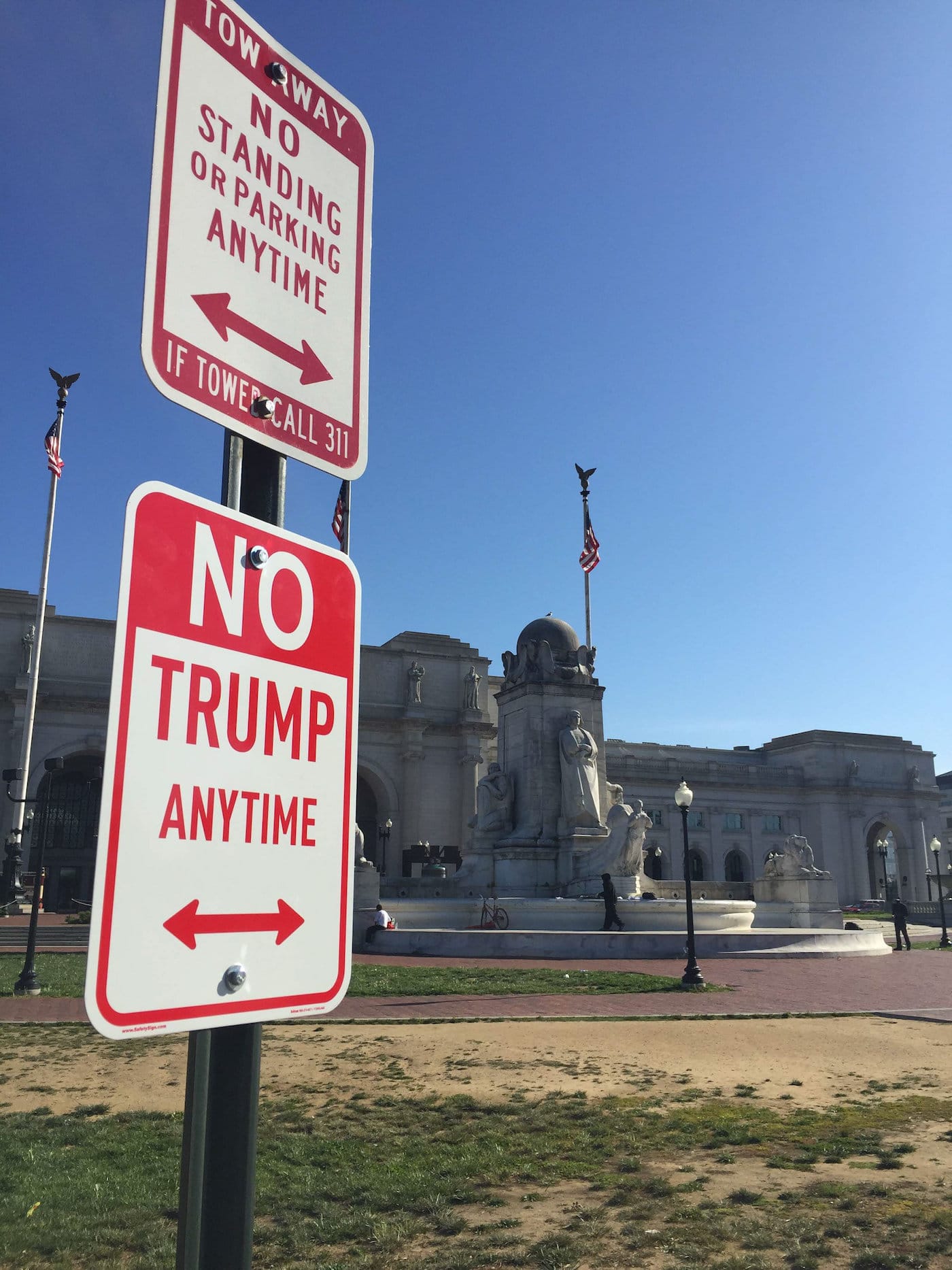 “ No Trump” signs appear in cities across the USA. - Signs spotted in New York, LA, Chicago, DC and Miami. - Outside Trump Building in New York - One sign is a stones throw from The Congress building. - A sign is outside Trump Tower in Chicago There has been a lot of protests about presidential favorite Donald Trump’s campaign but none as official looking as this. Days after the controversial GOP candidate cruised to victory in the New York primaries official looking “No Trump Anytime” signs have appeared in cities across the USA. The metal signs have be spotted in New York, Chicago, Los Angeles, Washington DC and Miami. It’s believed that the signs are not official sanctioned parking restrictions but instead are the work of controversial Los Angeles based street artist PLASTIC JESUS. In April 2015 the artist installed “No Kardashian Parking” signs around Hollywood a move that was widely commended by the general public. He also gained notoriety for his cocaine snorting oscars statue placed on Hollywood Blvd a few days before the 2015 Oscar ceremony. The former photo-journalist has become known for his guerrilla style street art. The signs first appeared over the weekend are located on some of the most famous location and busiest streets including Hollywood Blvd, Los Angeles, under the shadow of the congress building in Washington DC, and Union Station . There is even a sign outside Trump Tower in Chicago and a number of other Trump properties.