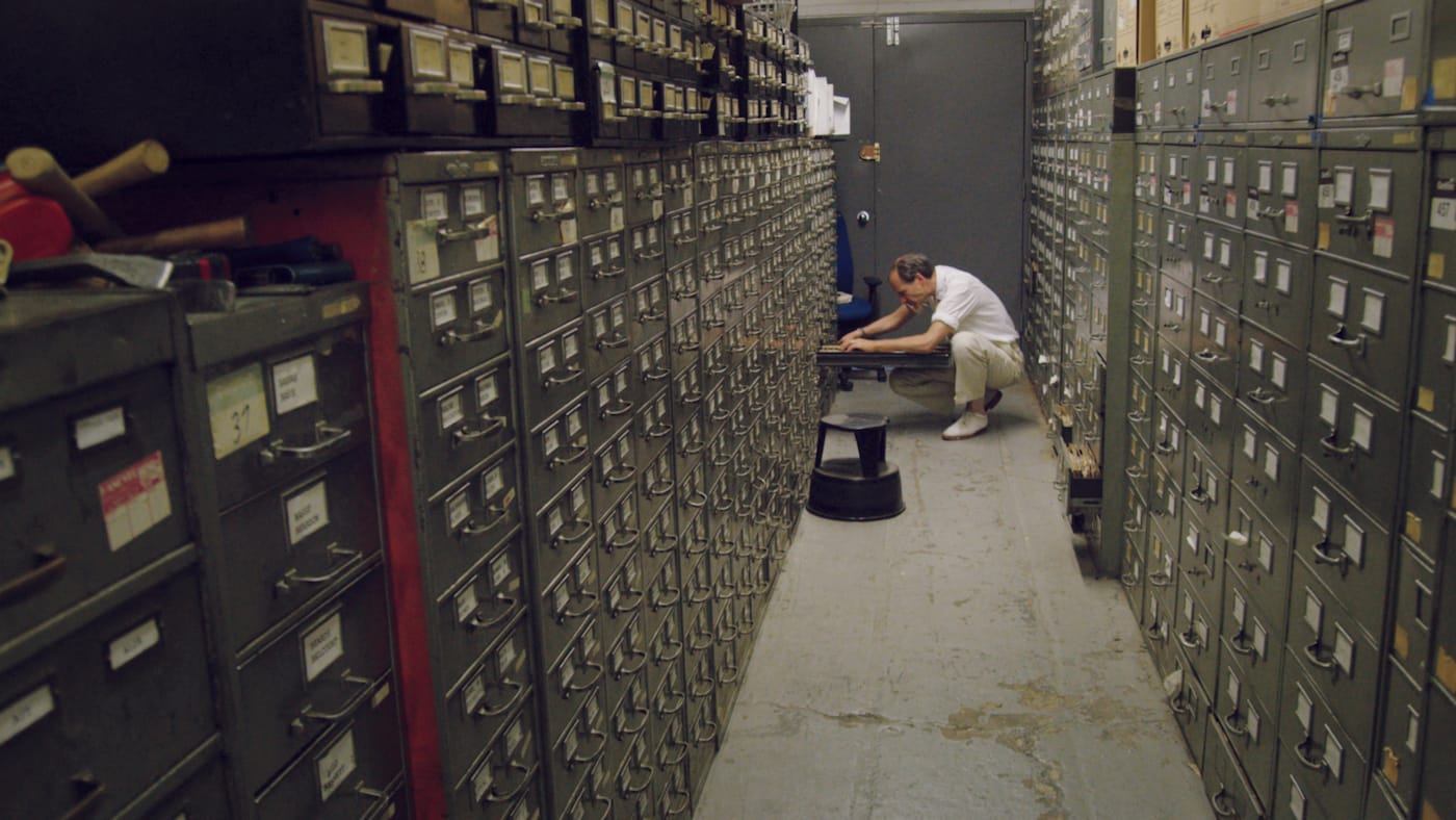 Jeff Roth searching the archives in the New York Times' "Morgue" (photo by Ben Wolf)