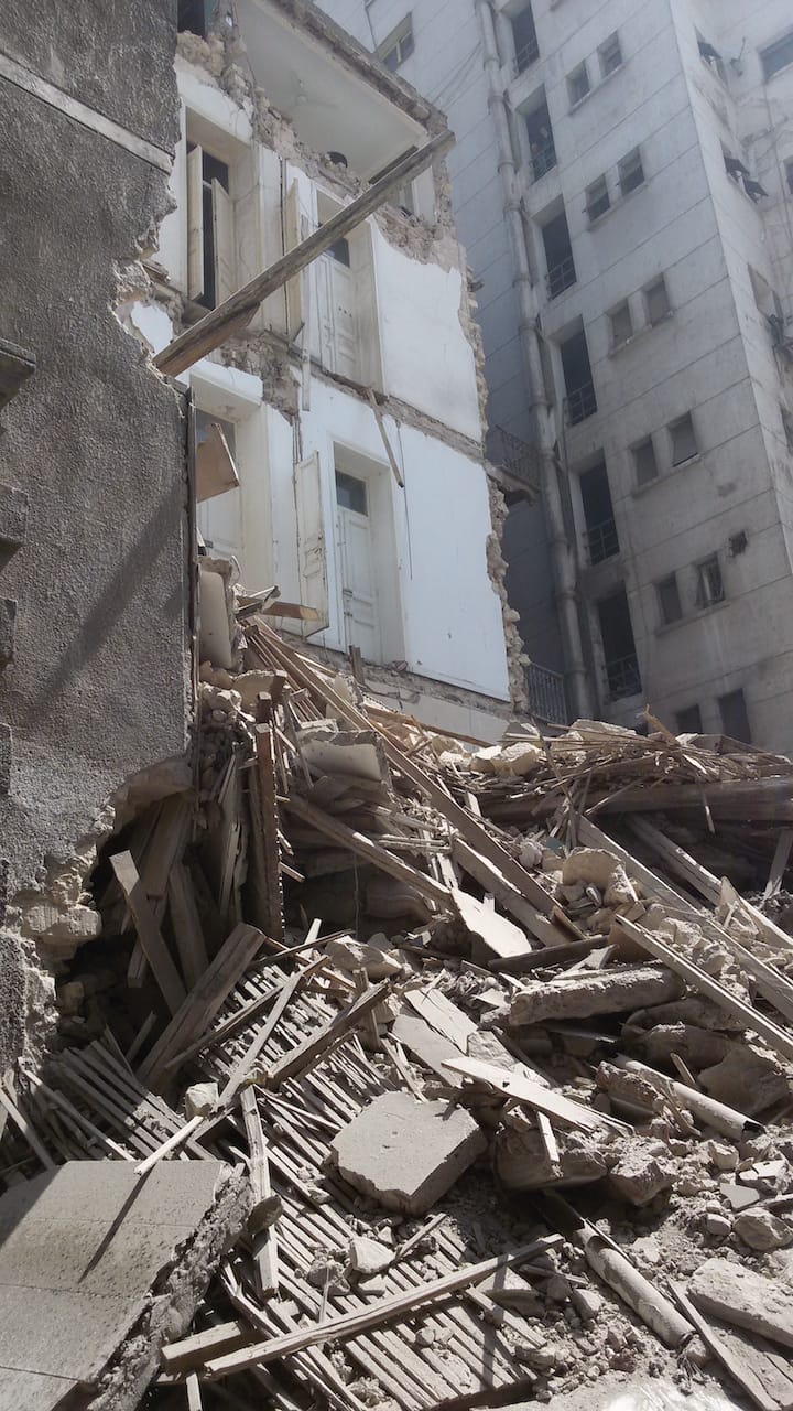 Debris in the street following the partial collapse of Townhouse Gallery's building in downtown Cairo
