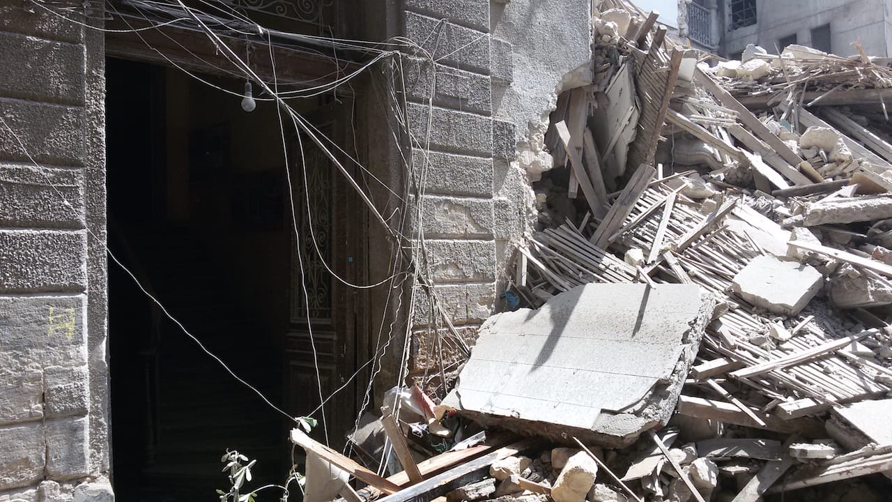 Debris in the street following the partial collapse of Townhouse Gallery's building in downtown Cairo