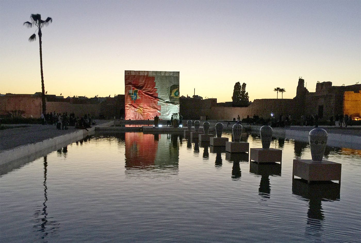 El Anatsui's massive work looks over the central courtyard of El Badii palace.