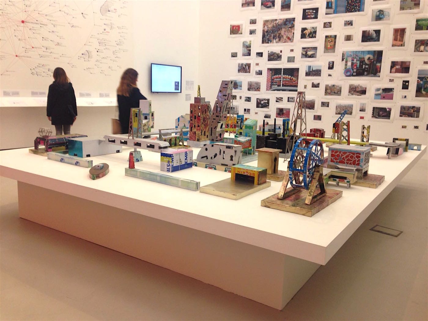 Exhibition view with Antonio Cosentino´s "Tin City" (2009-2013). Behind is the photographic series "Drift" (2004-2012), by Ali Taptik. Photography by the author.