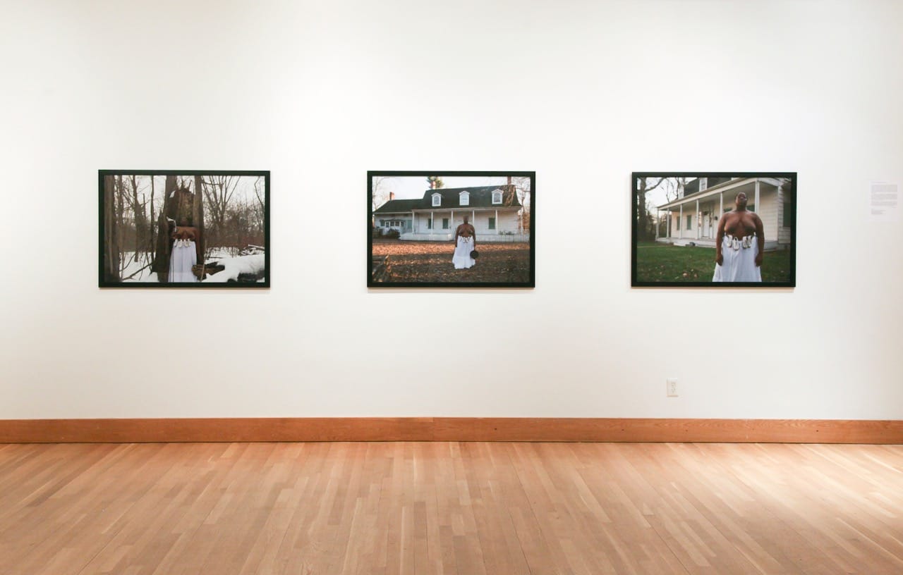 Installation view of Nona Faustine's photographs from her White Shoes series