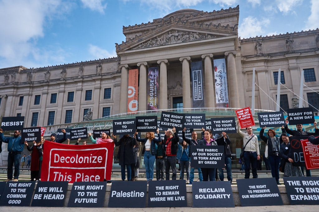 Protesters in front of the Brooklyn Museum (images via @kino___eye)