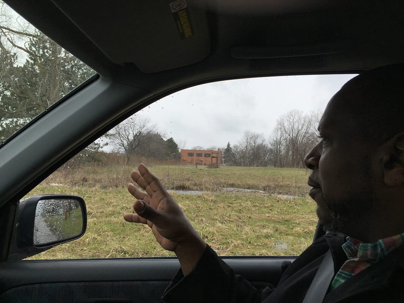Pharlon Randle, whose father had a good job in one of Flint’s automotive plants, points to the former site of an industrial complex called Buick City — now a wasteland of weeds and concrete slabs. Under the aegis of his Studio on the Go, Randle facilitates afterschool programs that emphasize musical performance.