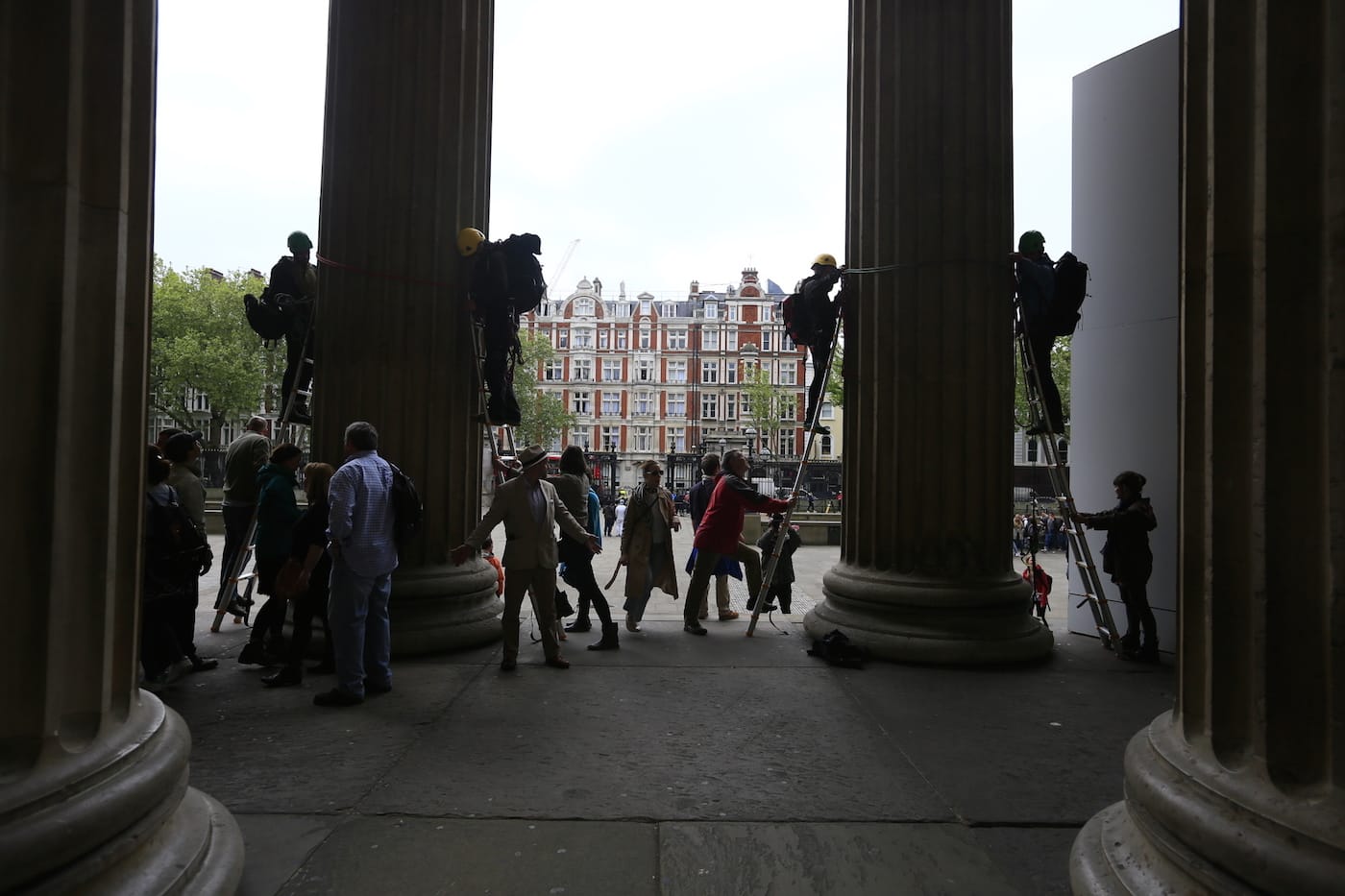 Greenpeace activists climb the British Museum in protest at BP’s sponsorship of a new exhibition ‘Sunken Cities’. The climbers unfurl seven huge banners down the front columns of the British Museum. The banners carry the names of cities and regions struck by flooding and climate change disasters.