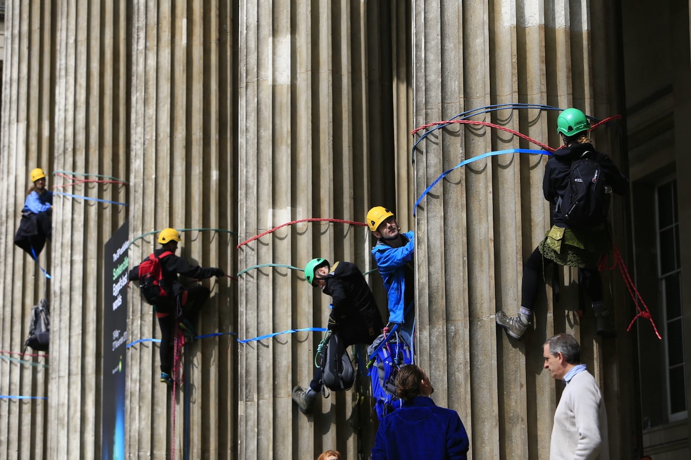 Greenpeace activists climb the British Museum in protest at BP’s sponsorship of a new exhibition ‘Sunken Cities’. The climbers unfurl seven huge banners down the front columns of the British Museum. The banners carry the names of cities and regions struck by flooding and climate change disasters.