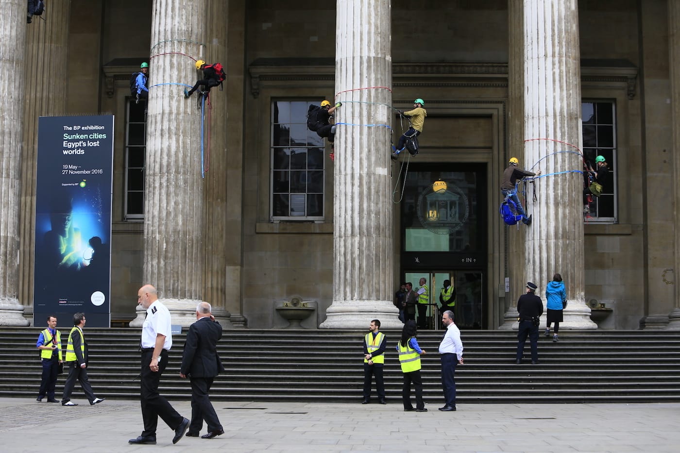 Greenpeace activists climb the British Museum in protest at BP’s sponsorship of a new exhibition ‘Sunken Cities’. The climbers unfurl seven huge banners down the front columns of the British Museum. The banners carry the names of cities and regions struck by flooding and climate change disasters.