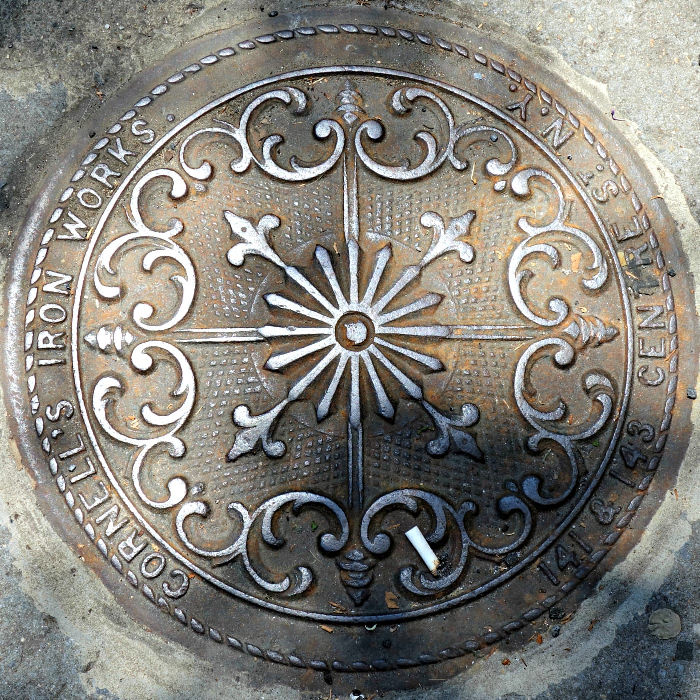 Cornell's Iron Works manhole cover