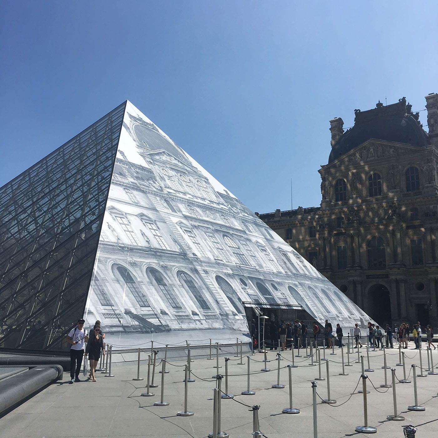 Installation view of 'JR at the Louvre'